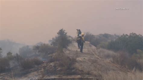 Wildfires torch structures in Riverside County; thousands evacuated